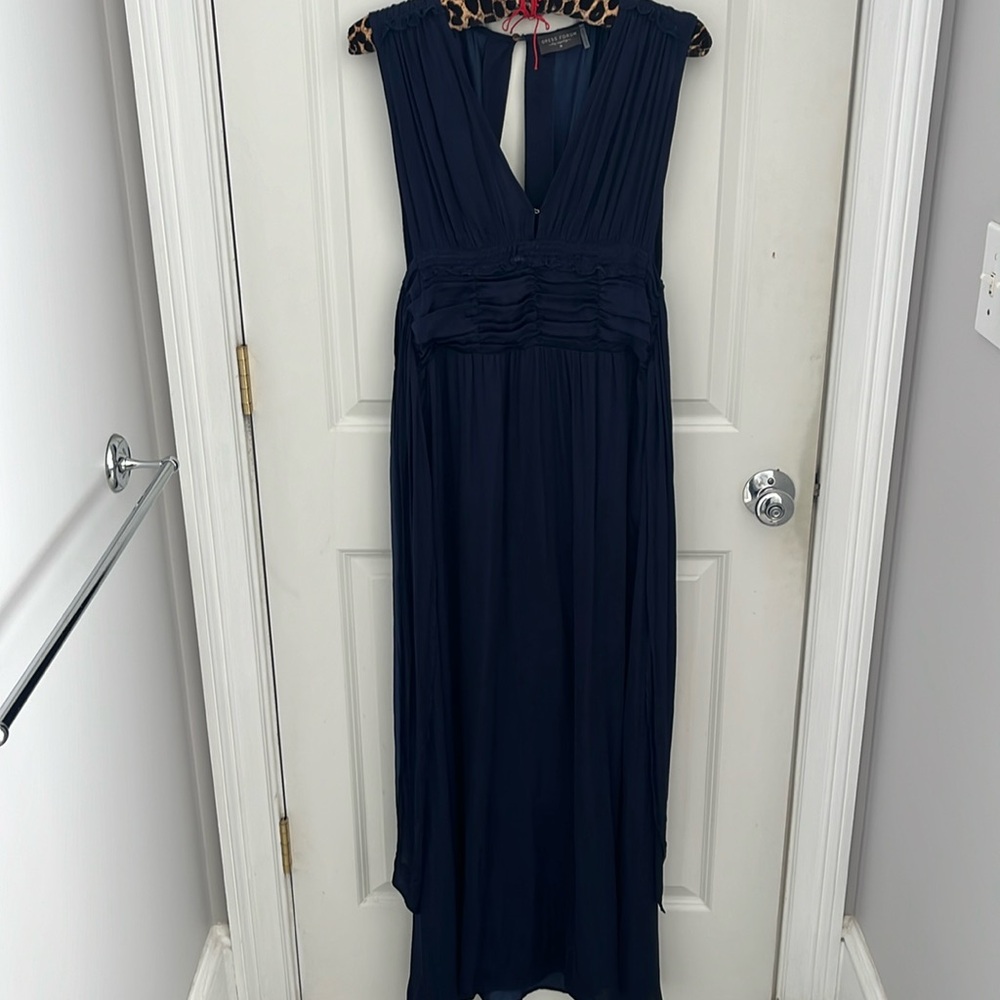Navy maxi dress with silky fabric ruffles and pleated detail